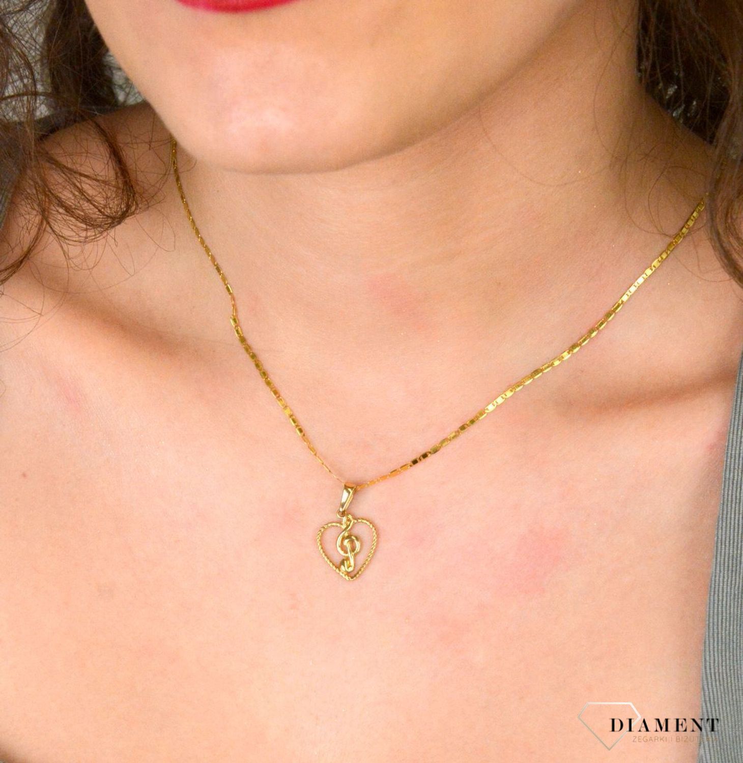 Złota zawieszka serce z kluczem wiolinowym 585.jpg